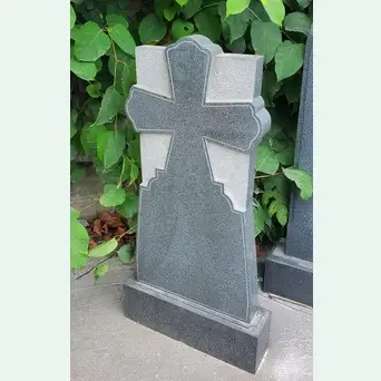 Памятник из серого гранита с крестом